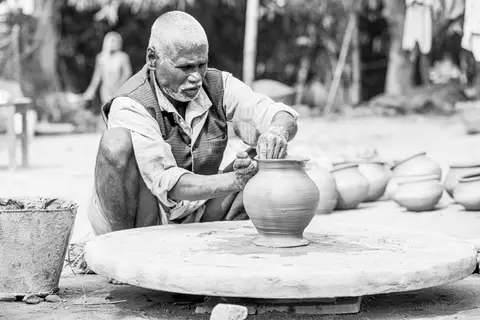 Artisans working in a small rural craft workshop in India