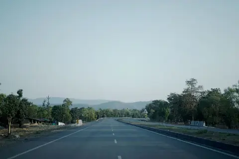 Construction of a national highway in India, illustrating government capital expenditure.