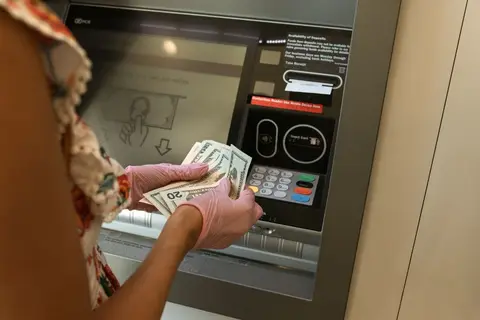 A customer at a bank counter in India