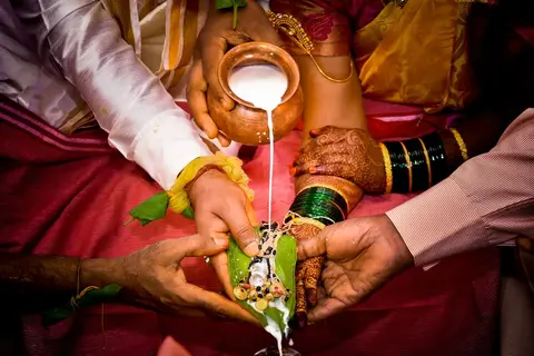 An Indian family working together in a traditional family business