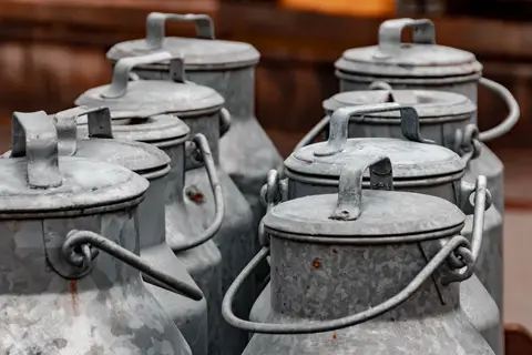 Farmers bringing milk to a cooperative collection centre in Kerala